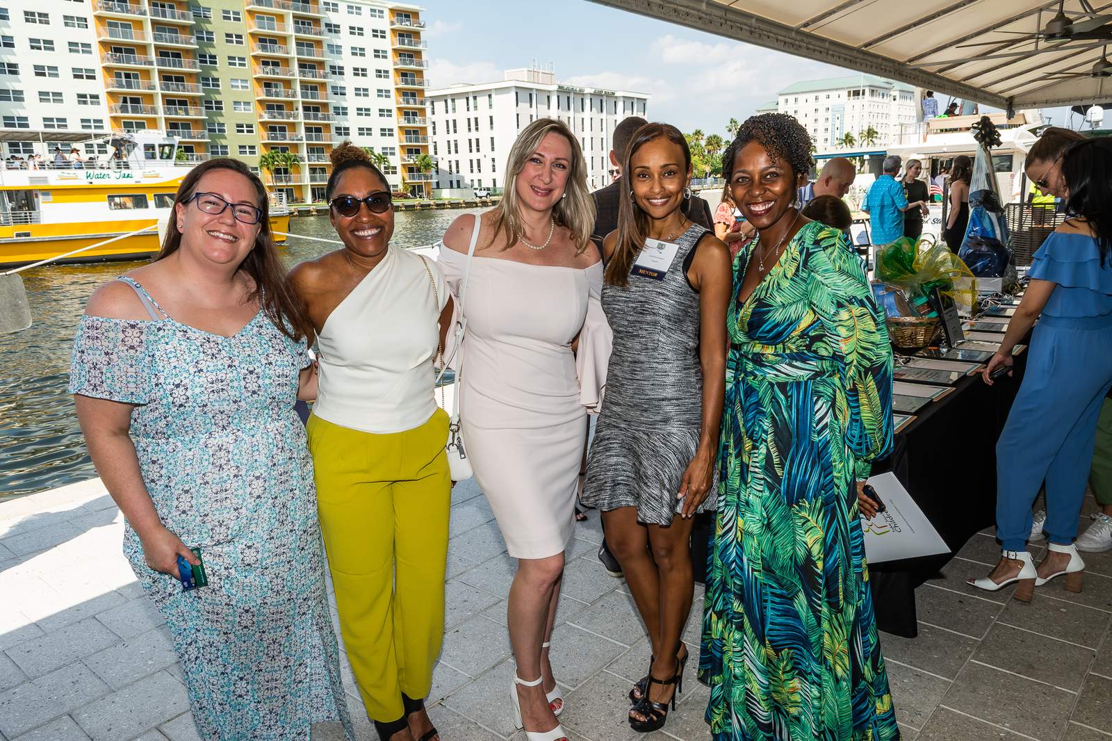 Guests arriving along the waterfront at a Take Stock in Children fundraiser