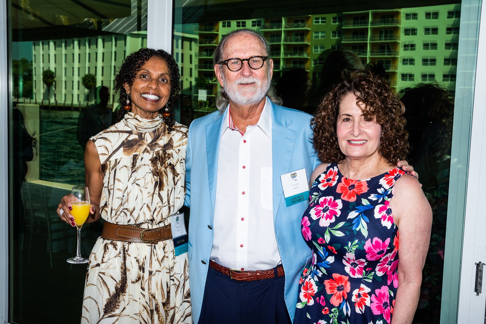 Three guests at a Take Stock in Children of Broward reception