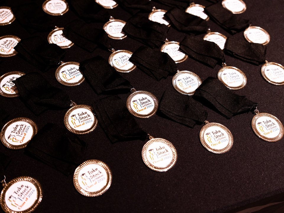Commencement medallions for the Take Stock in Children Broward Class of 2026