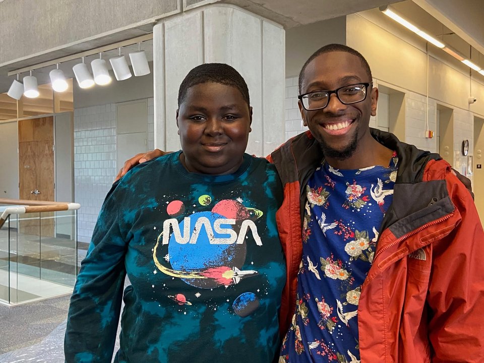 Take Stock in Children mentor and scholar smiling together on campus